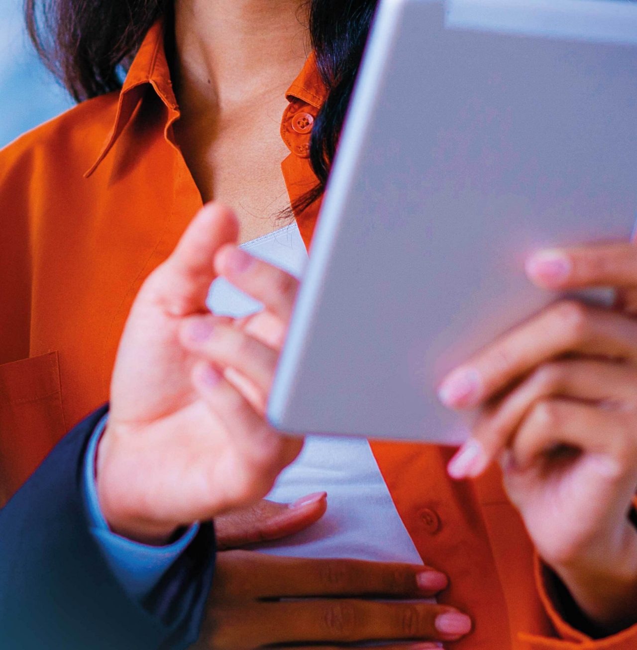 Continuation of colleagues looking at tablet