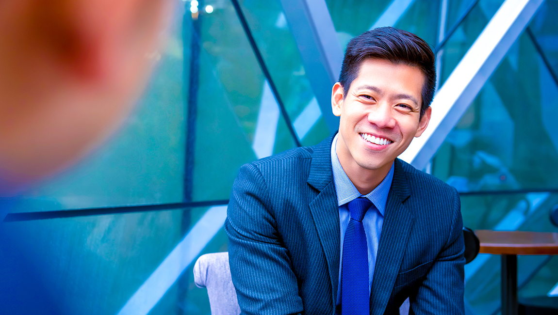 Happy businessman in a meeting