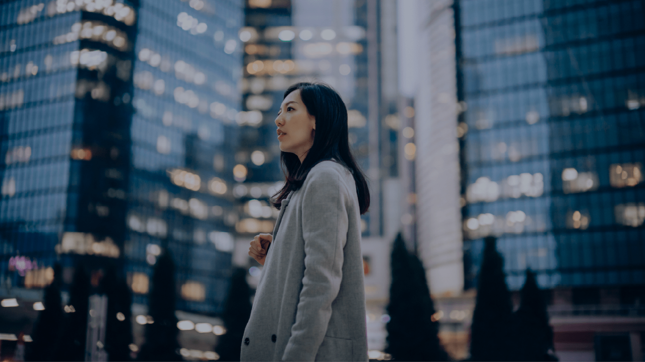A group of colleagues standing up and chatting